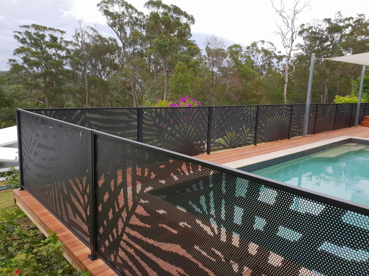 Palmy design pool fence panels on a garden wall, Queensland